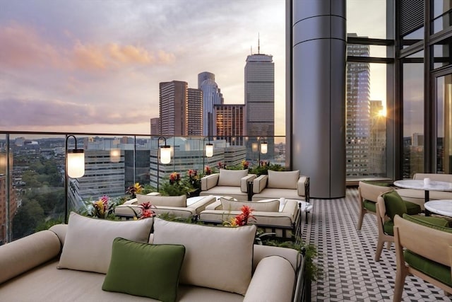 balcony featuring a view of city and an outdoor hangout area