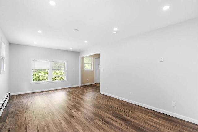 76 Beaver Rd, Ware, MA 01082 - spare room with wood finished floors, recessed lighting, and a baseboard radiator