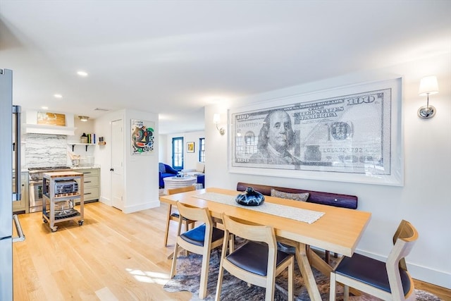 dining room featuring light hardwood / wood-style flooring