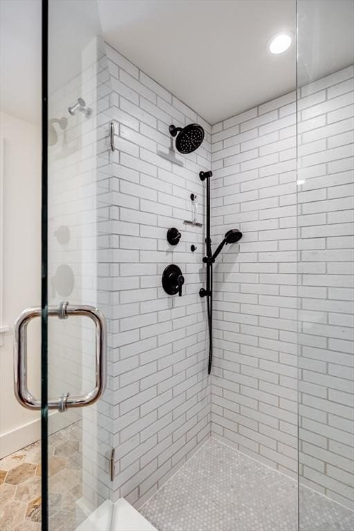 bathroom featuring an enclosed shower