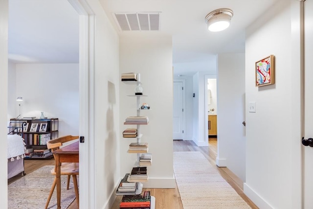 hall featuring light hardwood / wood-style floors