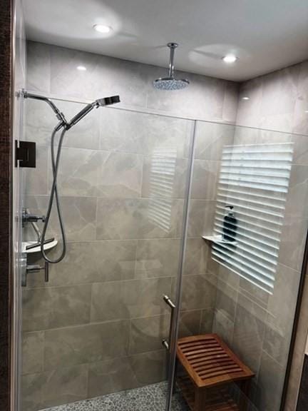 full bathroom with a stall shower