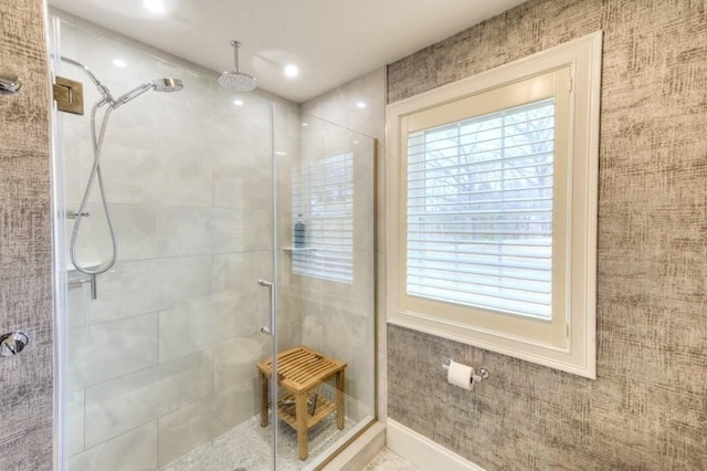 full bath featuring a shower stall