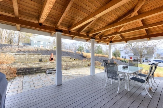 wooden deck with outdoor dining space