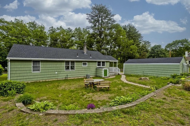 299 Shaker Rd, Westfield, MA 01085 - back of property featuring a yard and a shingled roof