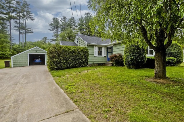 299 Shaker Rd, Westfield, MA 01085 - view of front of house featuring a garage, an outdoor structure, a front yard, driveway, and a shingled roof