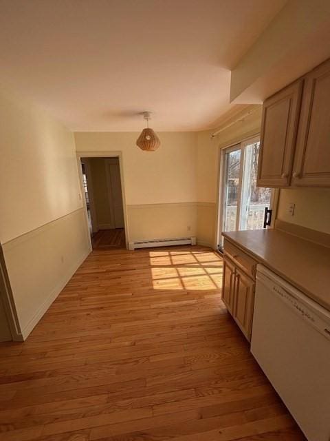 kitchen featuring baseboard heating, white dishwasher, and light wood finished floors