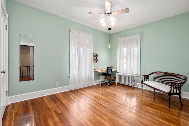 25 Autumn St, Everett, MA 02149 - office area featuring radiator heating unit, wood finished floors, and ceiling fan