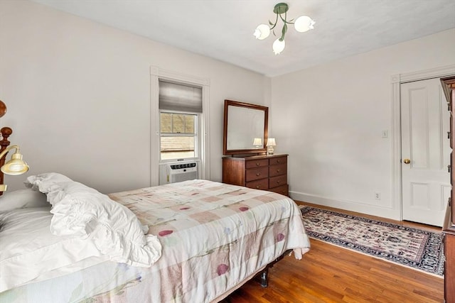 25 Autumn St, Everett, MA 02149 - bedroom featuring cooling unit, wood finished floors, and a chandelier