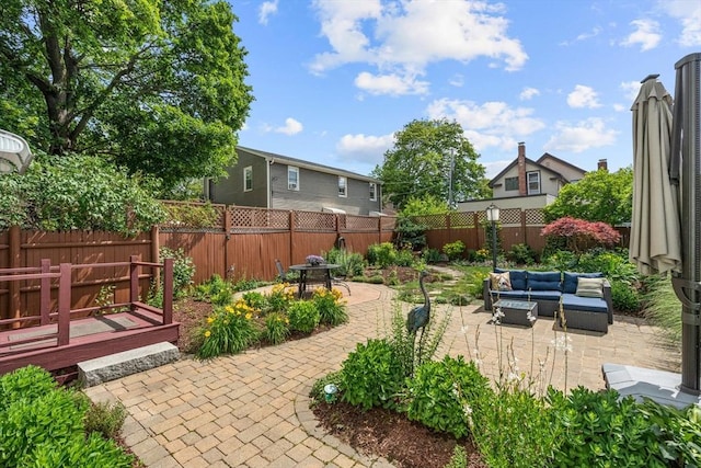 25 Autumn St, Everett, MA 02149 - fenced backyard featuring an outdoor living space and a patio
