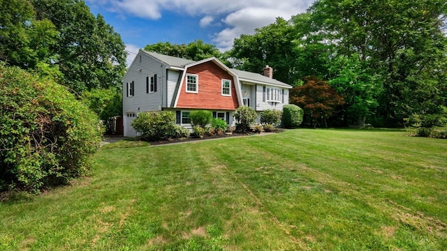 exterior space featuring a front lawn