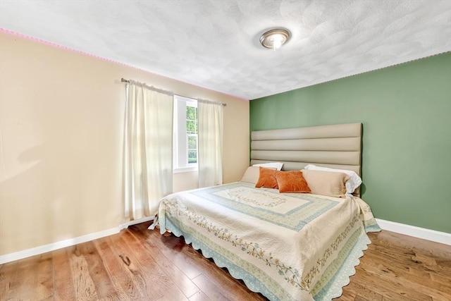 825 S St, Tewksbury, MA 01876 - bedroom with baseboards and wood finished floors