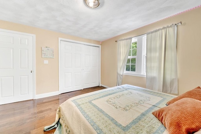 825 S St, Tewksbury, MA 01876 - bedroom with wood finished floors, baseboards, and a closet
