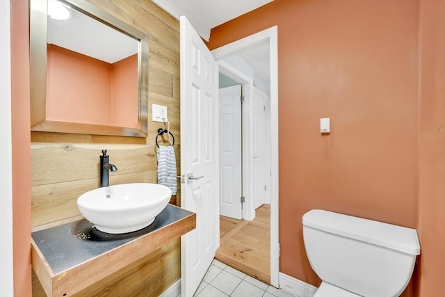825 S St, Tewksbury, MA 01876 - half bathroom featuring toilet, tile patterned flooring, and vanity