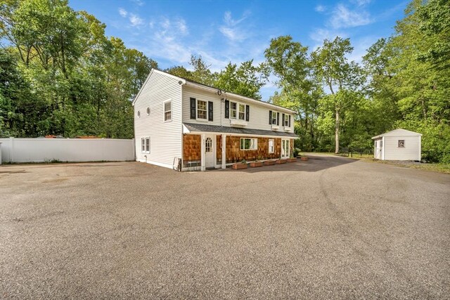 825 S St, Tewksbury, MA 01876 - view of front of property featuring view of scattered trees