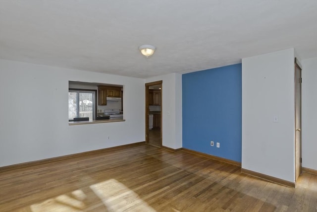 unfurnished room featuring light hardwood / wood-style flooring