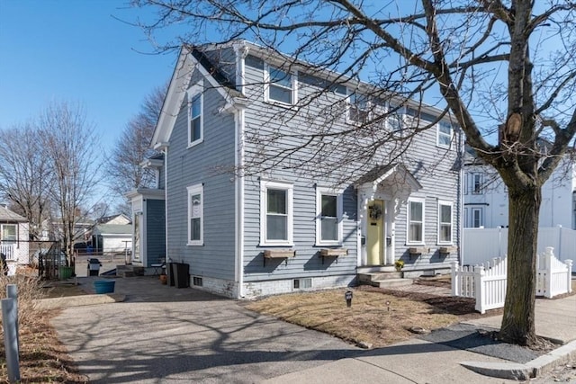 view of front of home with fence