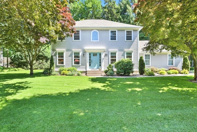 34 Hawks Cir, Westfield, MA 01085 - colonial home with a front lawn and a chimney