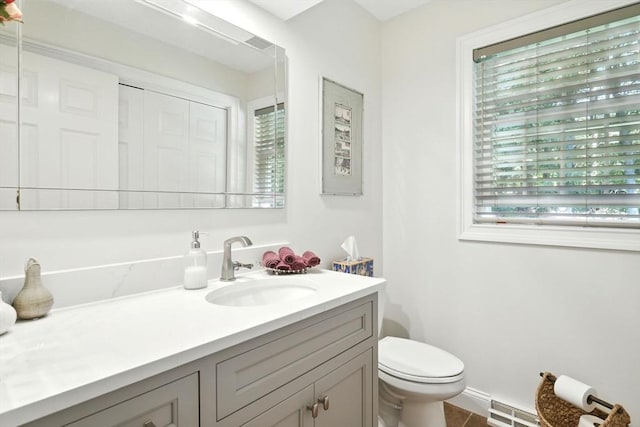 34 Hawks Cir, Westfield, MA 01085 - half bathroom with a baseboard radiator and vanity