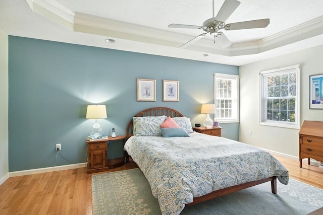 34 Hawks Cir, Westfield, MA 01085 - bedroom with a tray ceiling, crown molding, wood finished floors, and ceiling fan