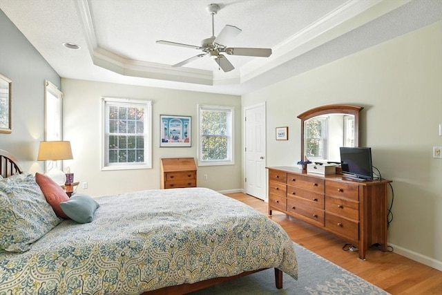 34 Hawks Cir, Westfield, MA 01085 - bedroom with a raised ceiling, light wood finished floors, crown molding, ceiling fan, and a desk