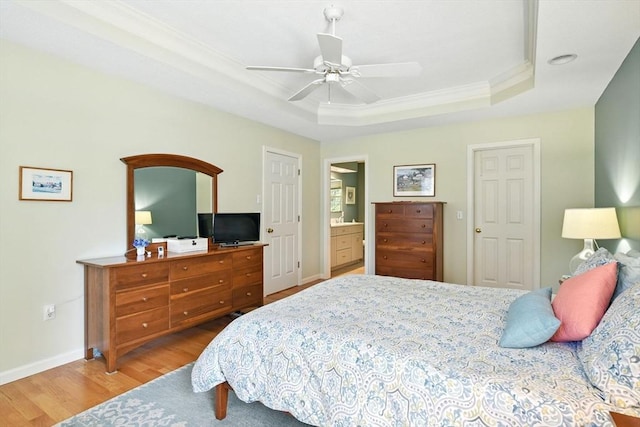 34 Hawks Cir, Westfield, MA 01085 - bedroom featuring a raised ceiling, wood finished floors, crown molding, ceiling fan, and ensuite bathroom