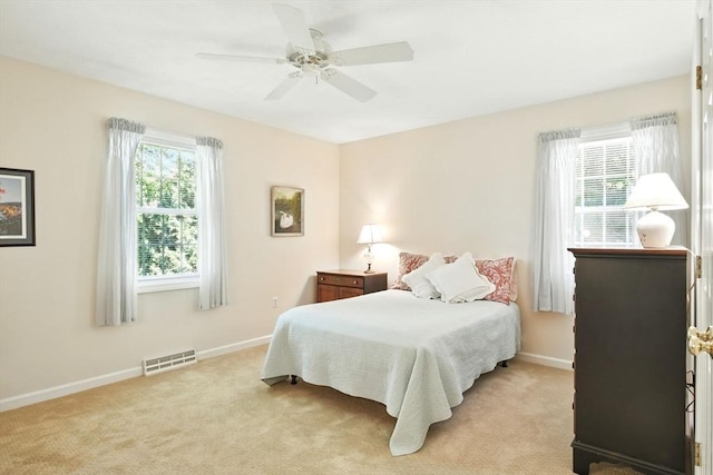 34 Hawks Cir, Westfield, MA 01085 - bedroom with light colored carpet and a ceiling fan