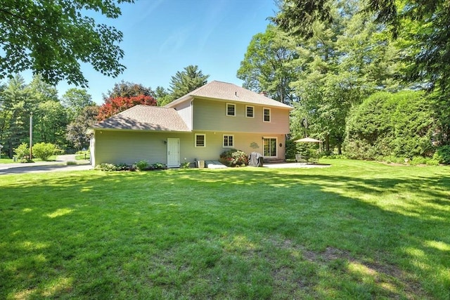 34 Hawks Cir, Westfield, MA 01085 - back of house featuring a yard and a patio area