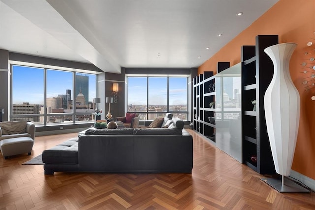 living room with a city view and a wealth of natural light