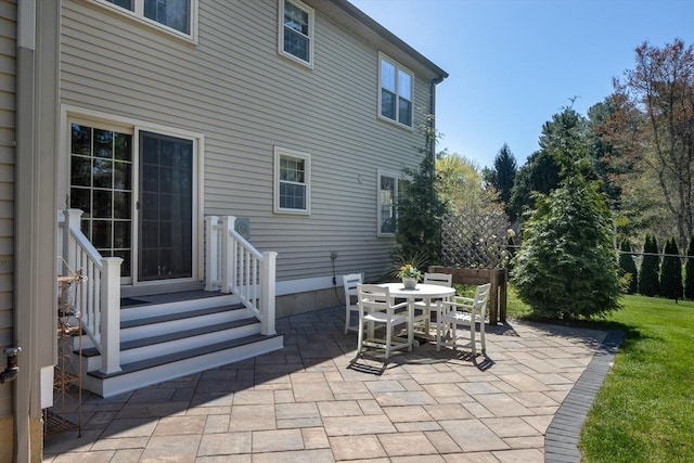 view of patio / terrace featuring fence and outdoor dining space