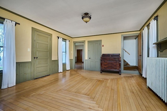 41 Coombs Hill Rd, Shelburne, MA 01340 - entrance foyer with a wainscoted wall, stairs, ornamental molding, and light wood-style floors