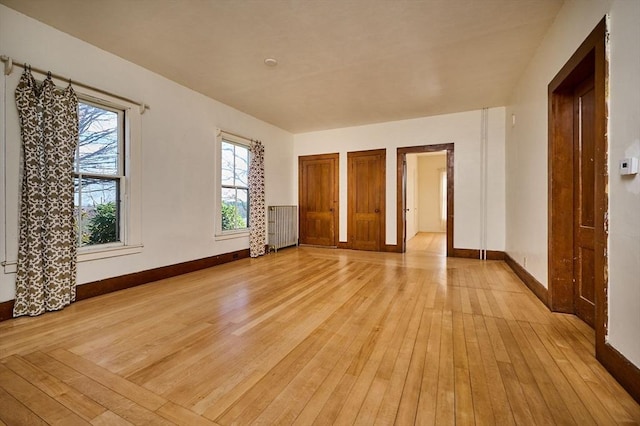 41 Coombs Hill Rd, Shelburne, MA 01340 - unfurnished room featuring radiator heating unit, light wood-style flooring, and baseboards