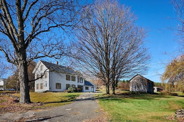 41 Coombs Hill Rd, Shelburne, MA 01340 - view of front of home featuring a front yard and an outbuilding