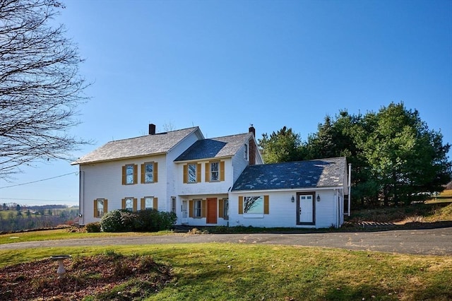 41 Coombs Hill Rd, Shelburne, MA 01340 - view of front facade featuring a front yard, curved driveway, and a chimney