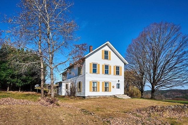 41 Coombs Hill Rd, Shelburne, MA 01340 - view of property exterior with a chimney