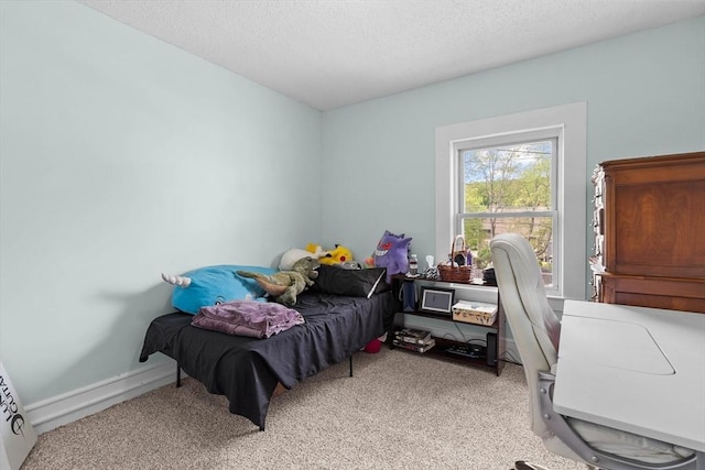 29 Sampson St Unit 29, Grafton, MA 01560 - bedroom with light colored carpet, a textured ceiling, and a desk