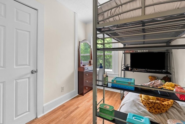 29 Sampson St Unit 29, Grafton, MA 01560 - bedroom featuring light wood-type flooring, baseboards, and a textured ceiling