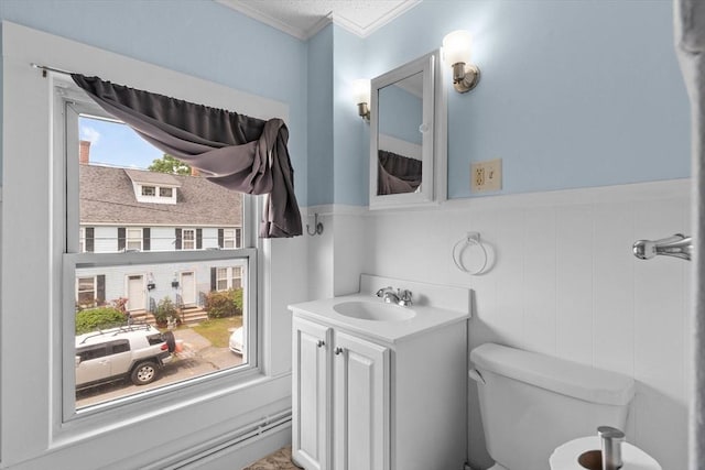 29 Sampson St Unit 29, Grafton, MA 01560 - bathroom with a wainscoted wall, ornamental molding, toilet, and vanity