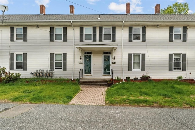 29 Sampson St Unit 29, Grafton, MA 01560 - view of front of home featuring a chimney and a front yard