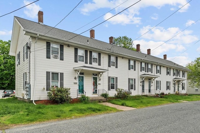 29 Sampson St Unit 29, Grafton, MA 01560 - view of front of property with a chimney and a front lawn
