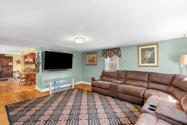 231 W Main St, Georgetown, MA 01833 - living area featuring wood finished floors and baseboards