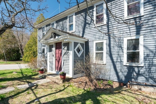 231 W Main St, Georgetown, MA 01833 - view of exterior entry with a lawn