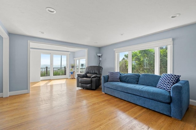 70 Williams St, Quincy, MA 02171 - living area with baseboards and light wood-style flooring