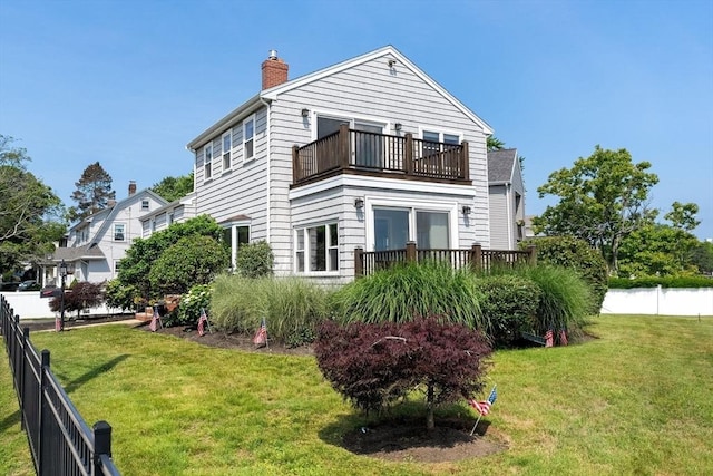 70 Williams St, Quincy, MA 02171 - view of side of property with a balcony and a chimney