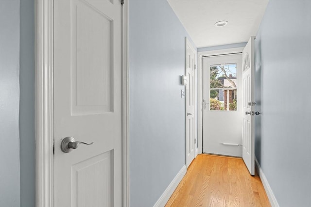 70 Williams St, Quincy, MA 02171 - corridor featuring light wood-type flooring and baseboards