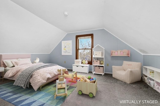 bedroom with vaulted ceiling and carpet flooring