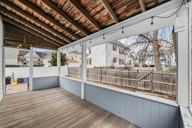 deck featuring a residential view and fence