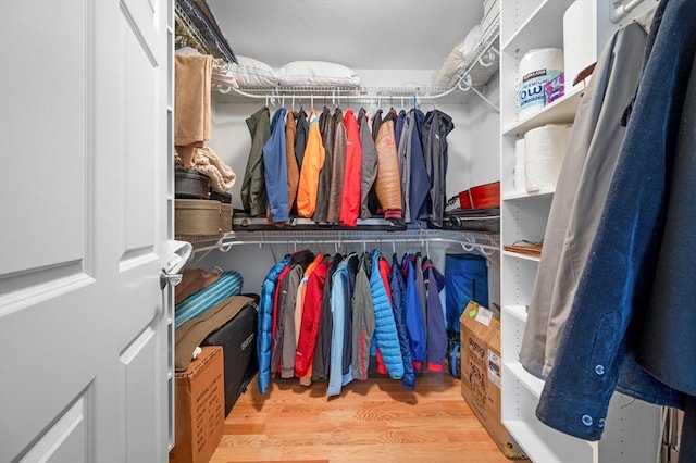 spacious closet with wood finished floors