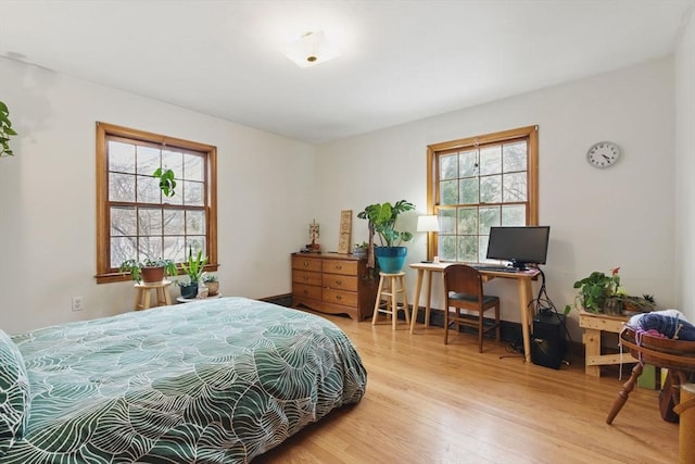 bedroom with wood finished floors