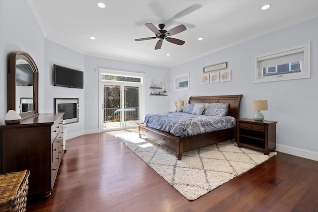 8 Garden St, Woburn, MA 01801 - bedroom with access to outside, ornamental molding, dark wood finished floors, baseboards, and a glass covered fireplace